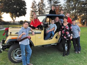 Tom and Felomena Barcellos have devoted most of their lives to dairy farming in central California’s Tulare County. They enjoy RVing with their seven grandchildren, from left: Brian, Mackenzie, Thomas (on Tom’s lap), Zachary, Frank, Emily, and Kadin.