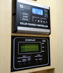 The digital display of a solar charge controller.
