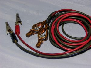 Twin alligator-clipped jumper leads.