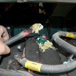 A corroded battery terminal connection.