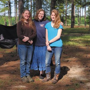Left to right: Mary Emma, Lindsay, and Jennifer Davis, who live full-time in a motorhome with their mother, Susan, and have been riding out the pandemic at a ministry center in Texas.