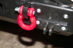 D-ring shackles serve as safety cable connection points and as a means to extract a stuck vehicle.
