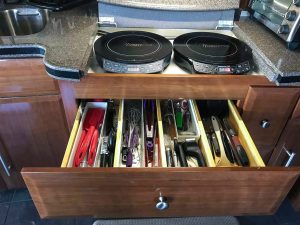 The large utility drawer is used regularly when the author cooks, so no changes were made to it.