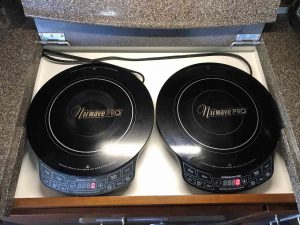 The author chose portable induction cookers, which easily can be replaced.