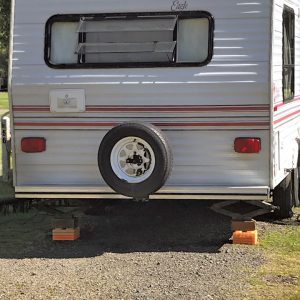 Usually, an RV should be leveled as soon as it’s situated on a suitable pad. An RV may be equipped with stabilizer jacks, but they should not be used to lift the RV. Rather, leveling is achieved with blocks (shown here) or leveling jacks.