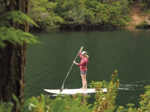 The beauty of coastal Oregon, and the many activities it offers, prompted the Ingrams to continually seek out new experiences, such as paddleboarding.