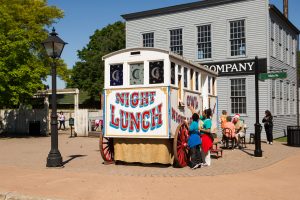 Guests at Greenfield Village, part of The Henry Ford, patronize the Owl Night Lunch Wagon (top), much like Henry Ford did in Detroit during the 1890s.