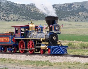 Utah’s Golden Spike National Historical Park displays replica steam locomotives. Park re-enactments depict the driving of the last spike that created the United States’ first transcontinental railroad on May 10, 1869.