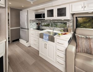 The Nautica 35MS, shown with Copper Ridge décor and Fossil painted cabinetry. Here, the well-equipped galley.