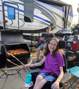 Emily and Daniel Benson cook at a rally.