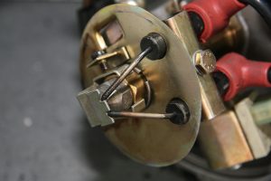 An electrode gapping tool is placed over the burner nozzle.