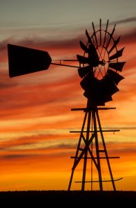 In Harney County, a dramatic sunset bathes the sky.