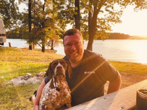 Ryan Fisher with Cadence, the family's Braque Francais.