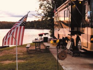 The motorhome named Windward at a campsite.