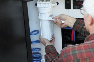 Before antifreeze is run through the plumbing system, remove the filter element from each of the RV’s water filters, and discard the filters.