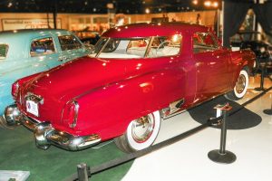 The 1950 Studebaker Commander Starlight Coupe featured an elongated trunk and a wraparound rear window.