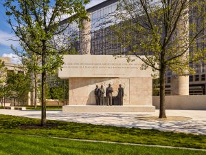 A sculpture at the new Dwight D. Eisenhower Memorial in Washington, D.C., depicts “Ike,” as president, with his advisors