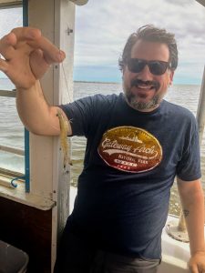 Jason Epperson displays part of the catch on the Biloxi Shrimping Trip.