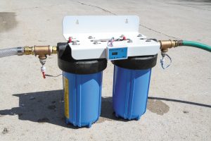 This deionizer system has a canister for each resin type. 