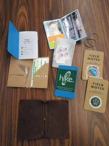 A travel journal can be personalized as much as the user desires, becoming an all-in-one source that holds various inserts and items that are easily accessible.