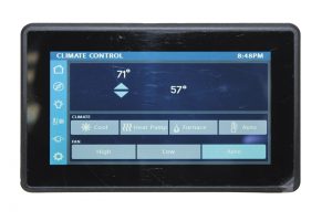 A touch-screen display controls the RV's networked multiplex wiring system.