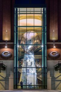 A 50-foot-tall Lombardi Trophy replica is displayed at Lambeau Field Atrium.