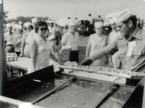In 1972, Hank (on the right) got Gorton’s Seafood to donate food for FMCA’s Burlington, Vermont, convention. Vera (in sunglasses) assisted. 