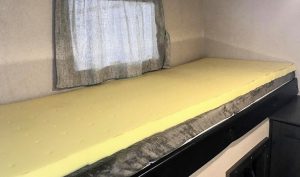 Memory foam can be cut to size and used as a topper for a standard bunk mattress.