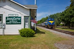 Former President Jimmy Carter receives recognition in Plains, Georgia, where his life is documented in a series of sites, including the train depot that served as his campaign headquarters.