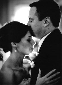 FMCA CEO Chris Smith and his wife, Jill, share a tender moment on their wedding day. The couple will mark a milestone this year as they celebrate 10 years of marriage on May 14.