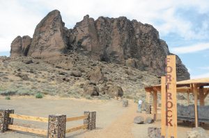 Fort Rock State Natural Area showcases a “tuff” formation caused by geologic upheaval. Towering jagged rock walls resemble a military fort.
