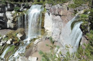 Near Paulina Lake, Paulina Falls cascades 80 feet down volcanic cliffs.