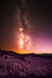 A meteor brightens Death Valley.