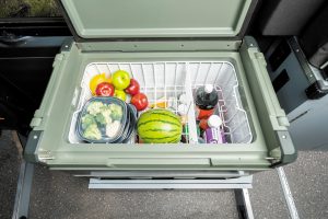The motorhome’s 2.1-cubic-foot top-loading refrigerator/freezer is portable.