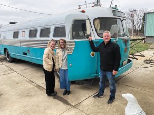 Bus 8227's current owner Steve Cramer (with wife, Shelli, and daughter Kady).
