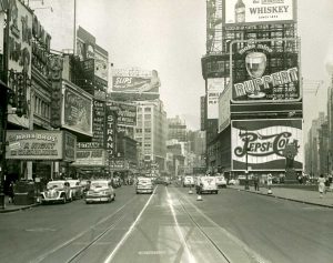 New York City’s Times Square grew to become the epicenter of outdoor advertising, including painted signs.