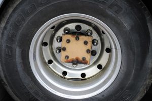 When towing automatic-transmission coaches, tow operators add particleboard or plastic to the pulled half-shafts to keep the lube in place.