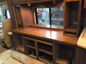 Davidson RV created a television lift in the author's motorhome, which conceals the TV until it is raised for viewing.