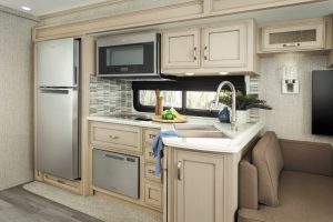 The 3927’s galley has a 30-inch convection-microwave and a three-burner range; a residential refrigerator and a dishwasher are offered. 