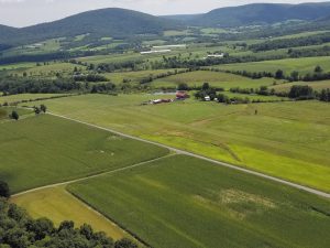 When Charlie Schrenkel and wife Jean bought a Pennsylvania farm, they lived on-site in their motorhome, and he built a grass runway for his Piper Cub.