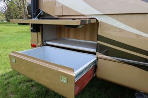 An exterior bay comes with a pull-out drawer and a removable shelf.