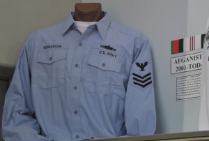 Military branches are recognized, including the U.S. Navy.