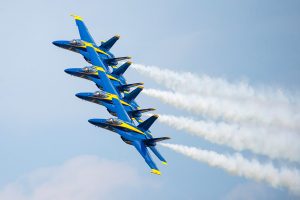 The U.S. Navy Blue Angels flight demonstration team thrills audiences with their precision maneuvers at air shows throughout the country.