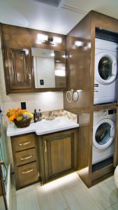 The bath area includes room for a stackable washer and dryer.
