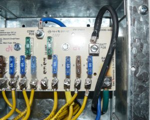 The converter usually is where you find AC circuit breakers and 12-volt fuses.