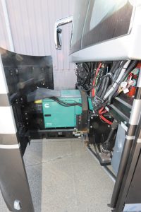 A Cummins Onan 12,500-watt diesel generator assists with power needs.