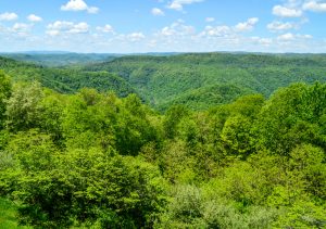 Pipestem Resort State Park (left) offers camping and numerous other amenities.