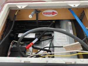 A Proteng unit was installed behind this absorption-style RV refrigerator to add another layer of protection.