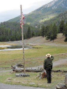 Saluting the U.S. flag at the Madison Information Station.