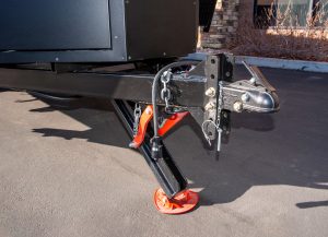 The Overland comes with an adjustable-height receiver hitch and a fold-up flat jack that allows room for a storage box.